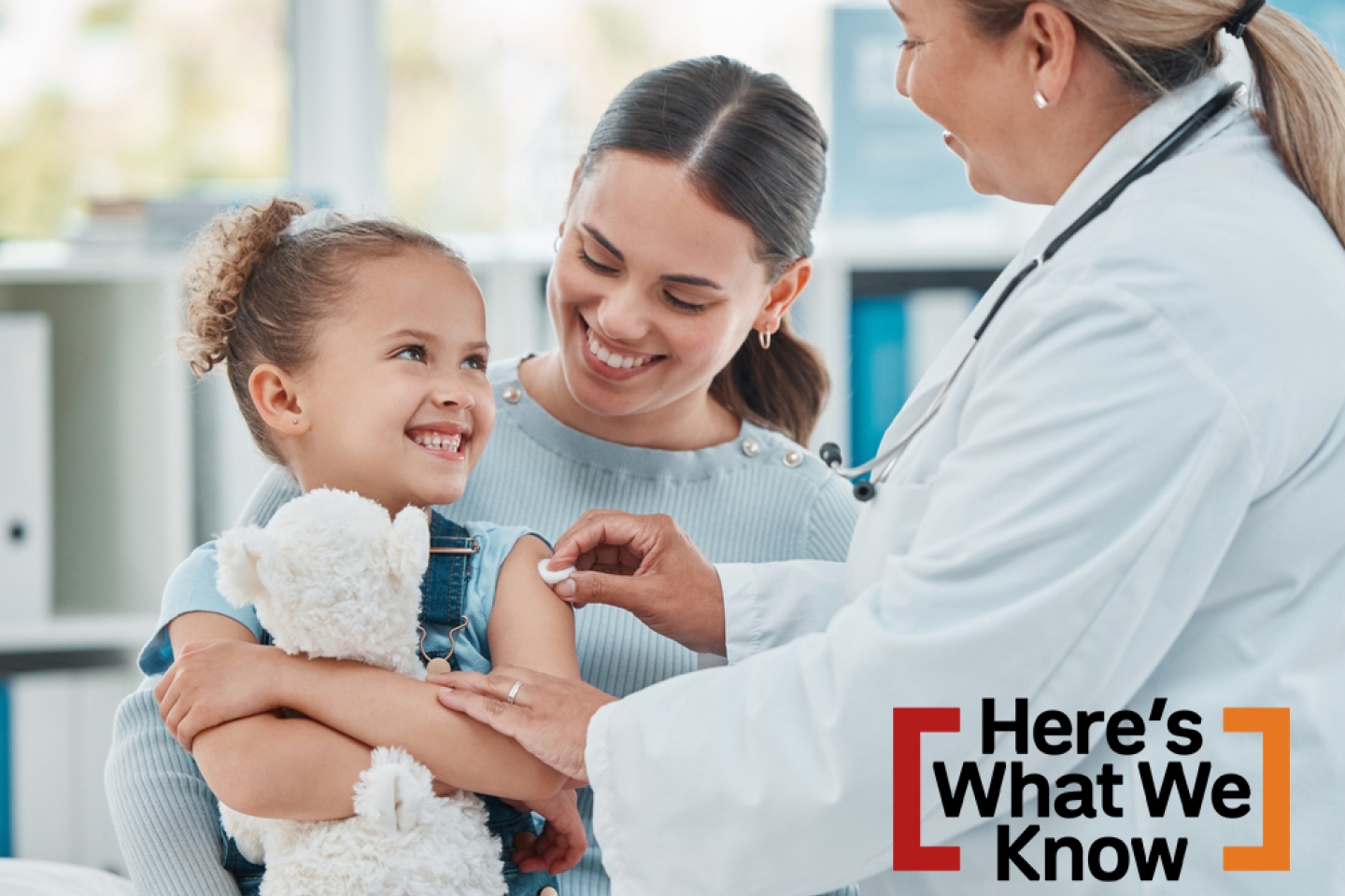 young girl getting vaccinated