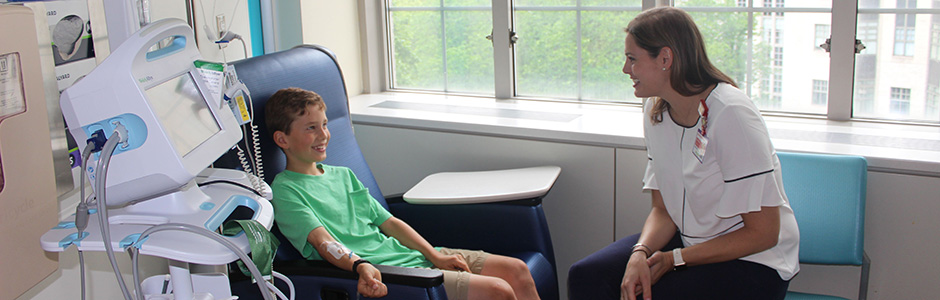 A Weill Cornell Medicine provider interacts with a patient.