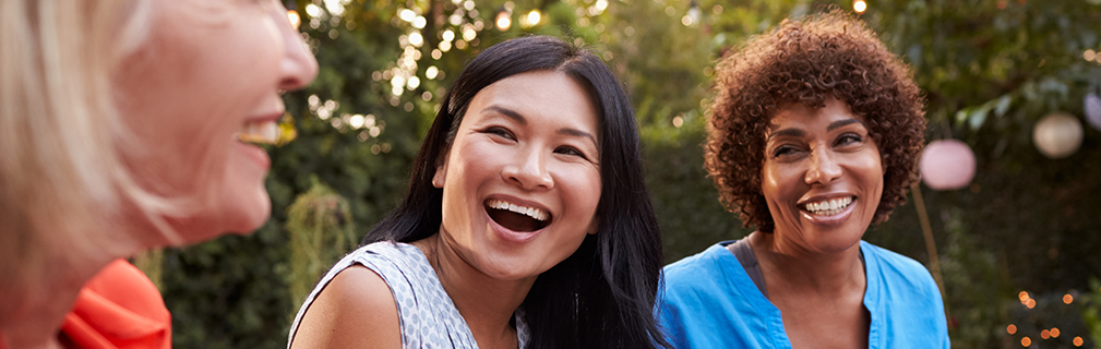 Group of older women laughing and smiling