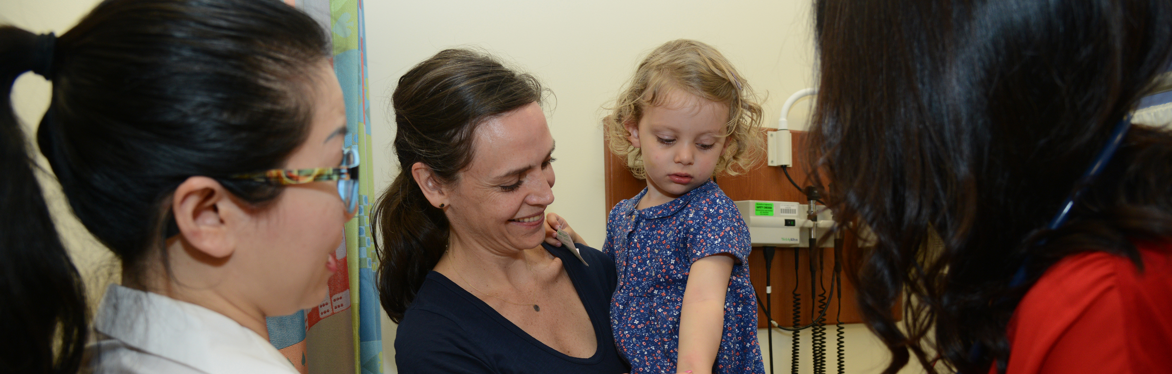 The Weill Cornell Medicine Pediatric Allergy and Immunology team examining a pediatric patient